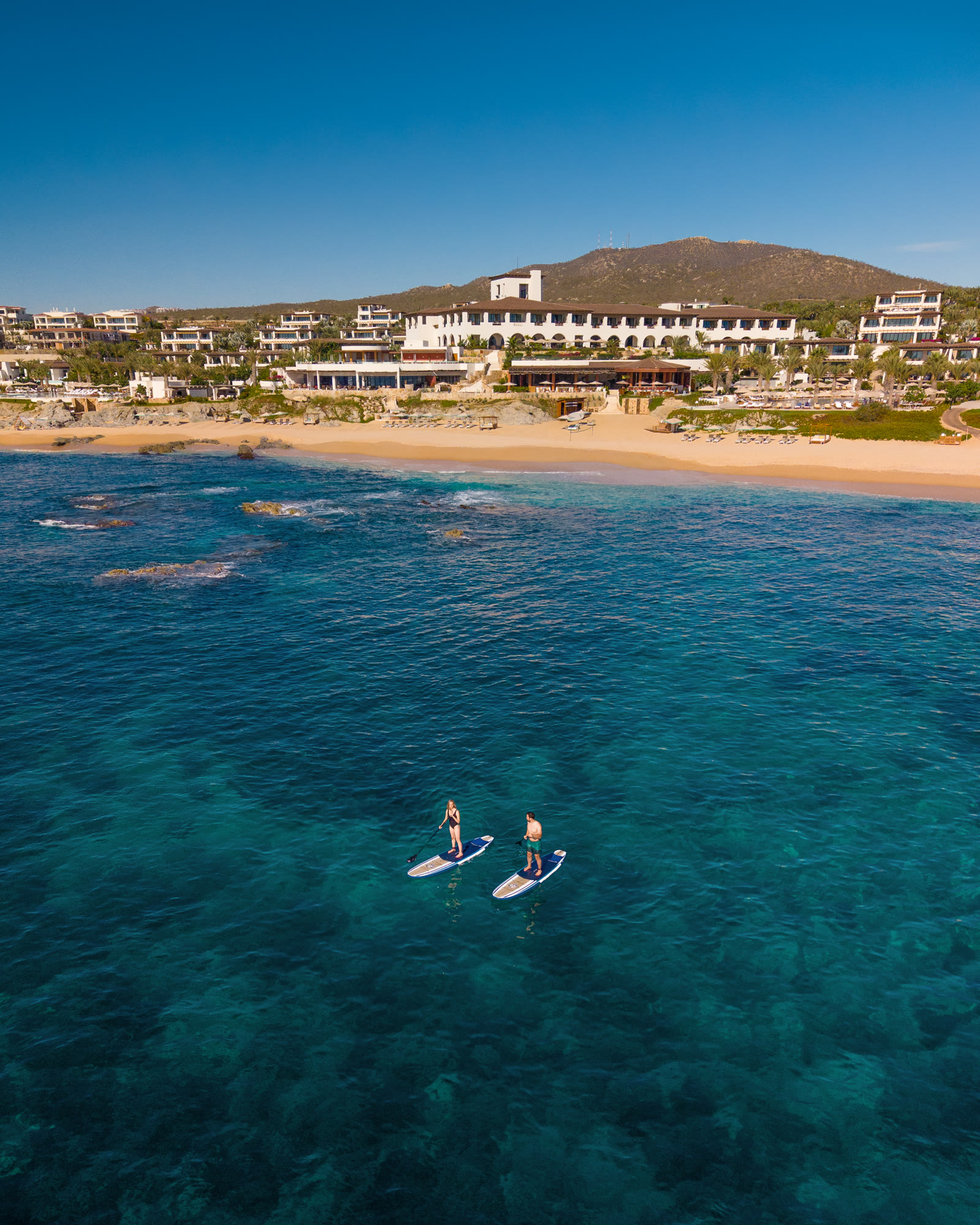 Paddleboards off the beach · Four Seasons Los Cabos
