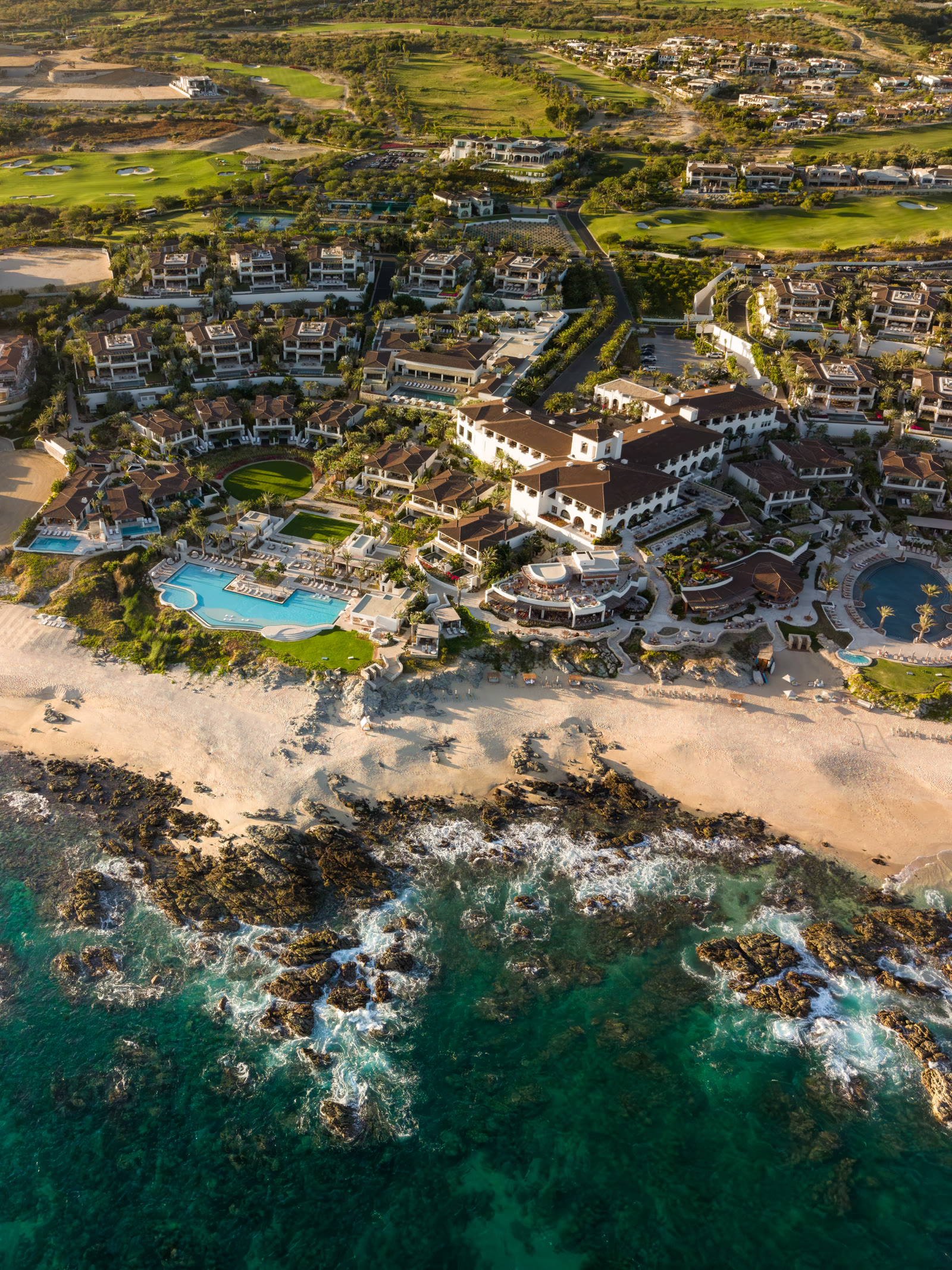 The resort at golden hour · Four Seasons Los Cabos
