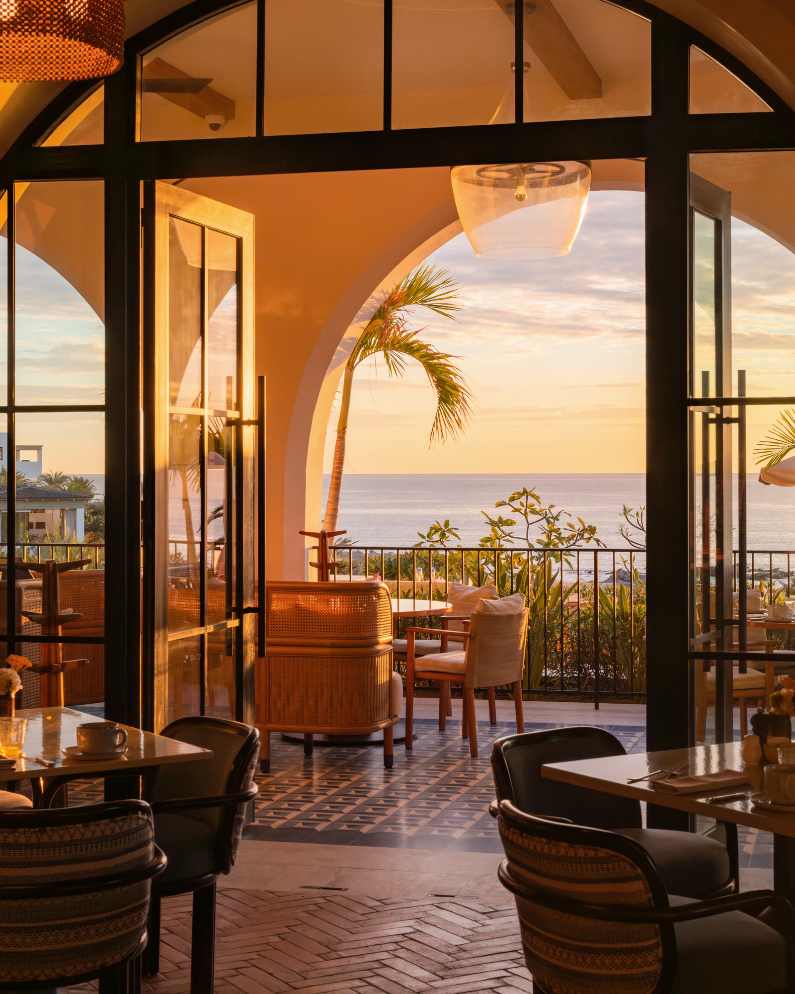 Terrace at sunset · Four Seasons Los Cabos