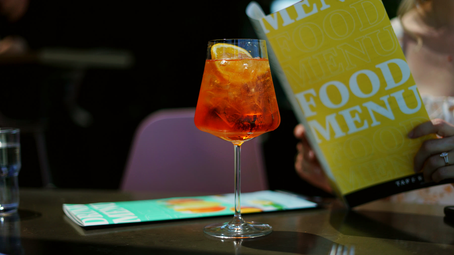 Aperol spritz and the menu · Tap & Barrel